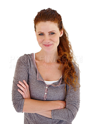 Buy stock photo A young confident caucasian lady standing with crossed hands in a white isolated background.
Studio shot of a beautiful young smiling woman dressed in casual wear against a white background.