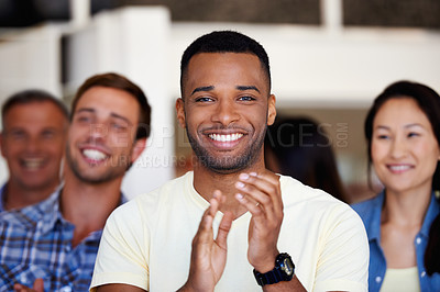 Buy stock photo Man, portrait and applause with crowd in office with smile, celebration or excited for goal at startup company. Person, happy and cheers for success in audience, meeting or seminar at creative agency