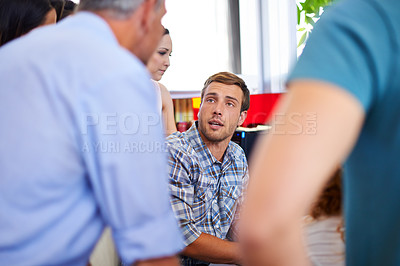 Buy stock photo Business people, circle and man in discussion at startup, meeting and listen with synergy in modern office. Group, scrum and talking with teamwork, brainstorming or problem solving at creative agency