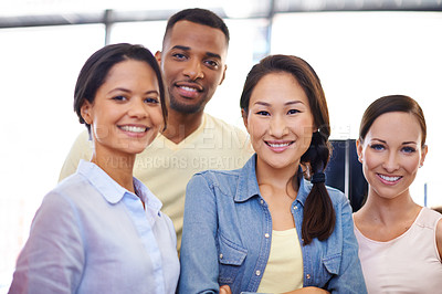 Buy stock photo Portrait of a group of business colleagues in an informal office environment