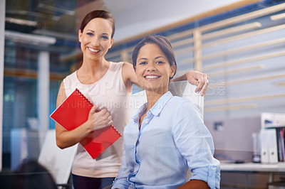 Buy stock photo Portrait of two female design professionals in the office