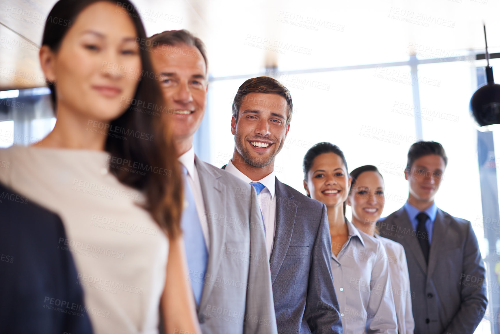 Buy stock photo Portrait, smile and row of business people in office together with diversity, equality and solidarity. About us, support and happy legal team with confidence, pride and management at corporate agency