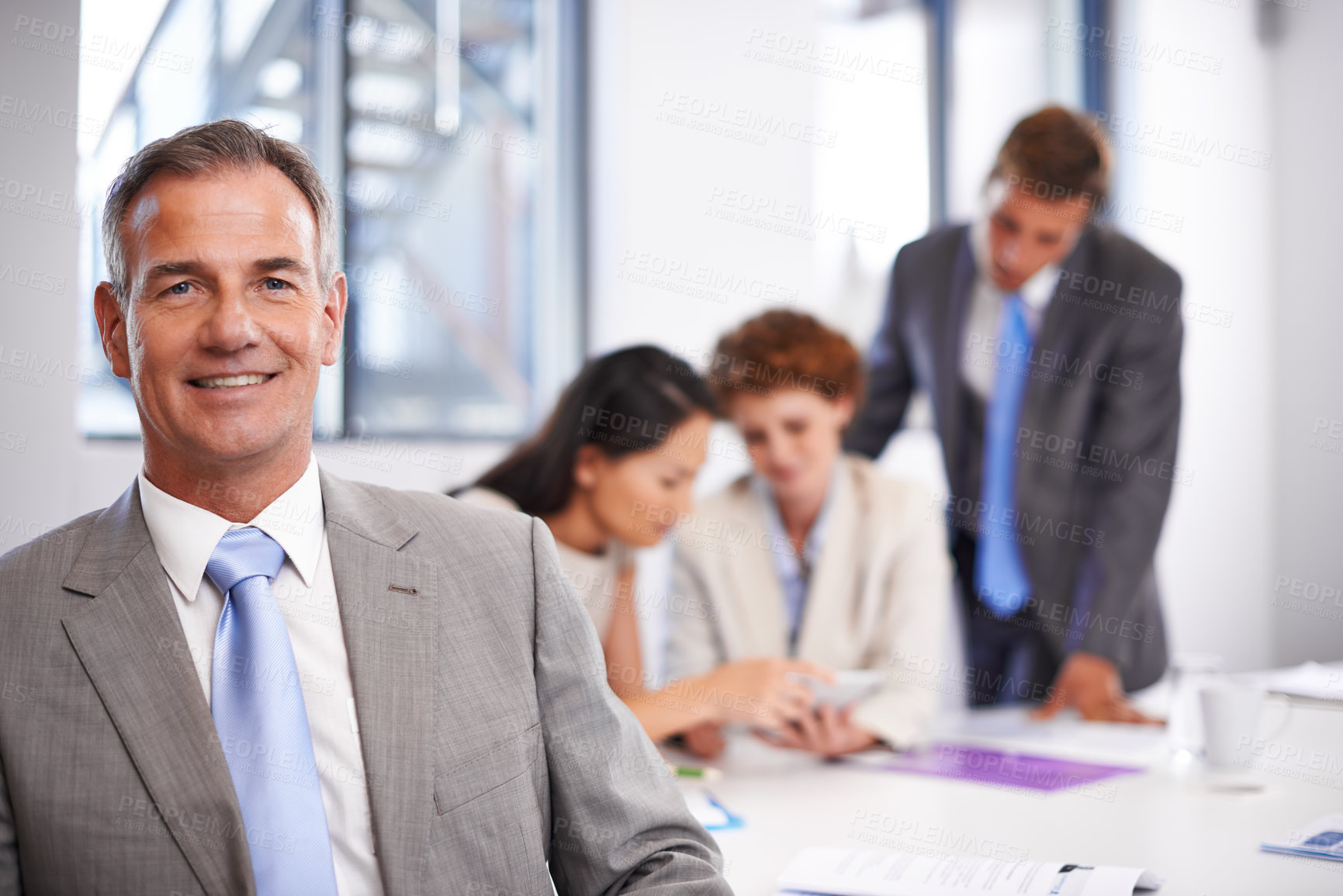 Buy stock photo Mature man, meeting and business portrait with collaboration, teamwork and lawyer brief in office. Boardroom, employee and staff together with planning at law firm with working on attorney case