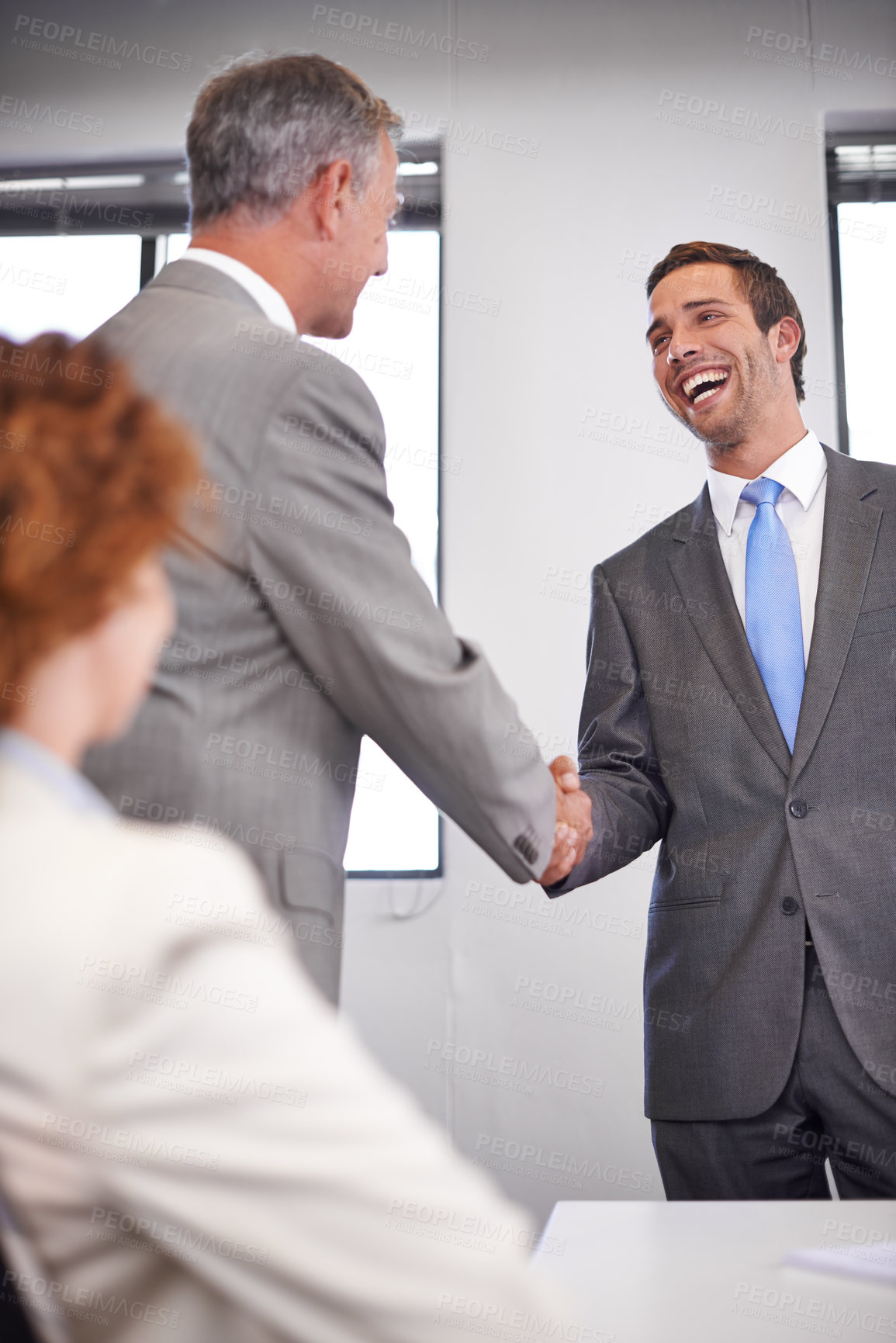 Buy stock photo Happy, meeting and business people with handshake in office for partnership, consultation and deal. Director, negotiation and shaking hands with subsidiary for merger, agreement and b2b acquisition