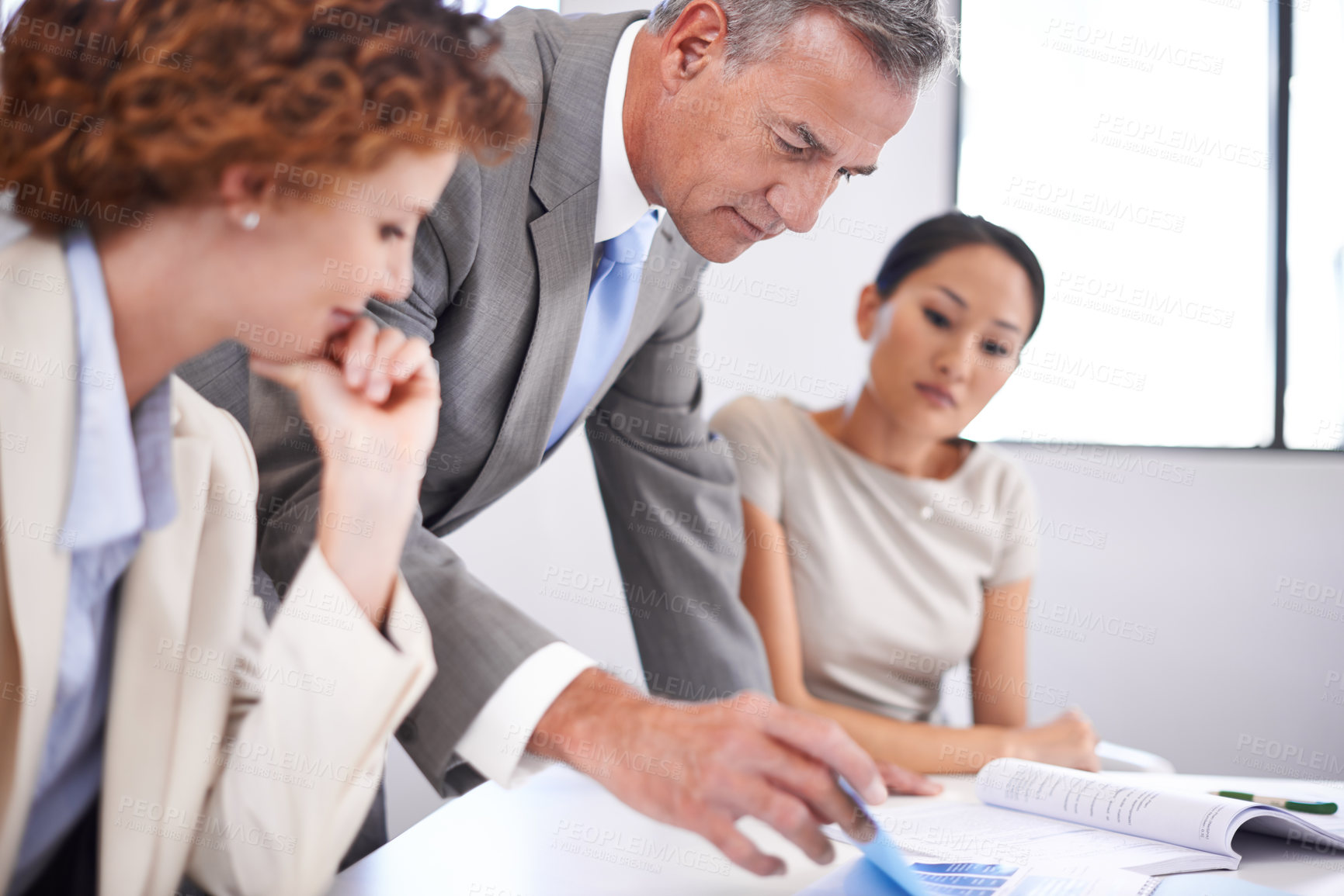 Buy stock photo Shot of a group of business colleagues in a meeting