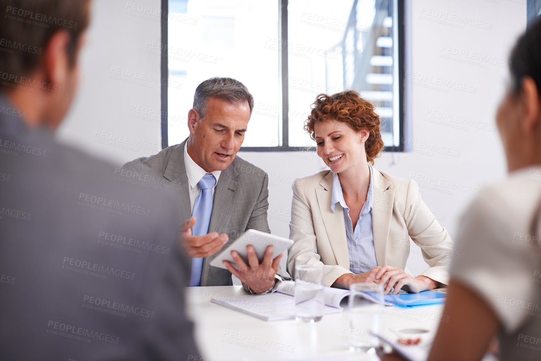 Buy stock photo Meeting, documents and business people on tablet in discussion for planning, teamwork and collaboration. Corporate, office and men and women on digital tech for feedback, review and finance report