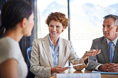 Buy stock photo Meeting, talking and business people in office for planning, teamwork and collaboration with documents. Corporate, professional and men and women with paperwork for feedback, review or finance report