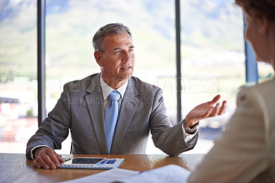 Buy stock photo Mature, businessman and colleague in office for review, feedback and advice in mentorship or company. Male person, conversation and discussion with coworking, teamwork and collaboration for workplace