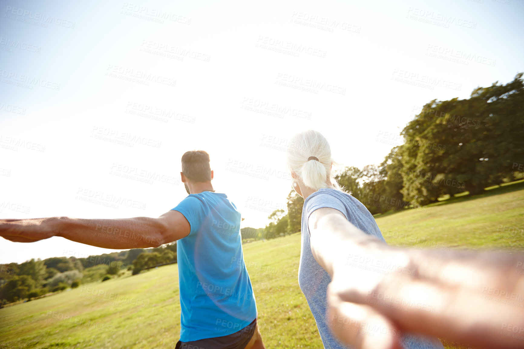 Buy stock photo Couple, stretching and fitness with yoga in park for exercise, balance and mobility in nature. Back, mature people and warrior pose on grass for arm workout, holistic wellness and mockup with pilates