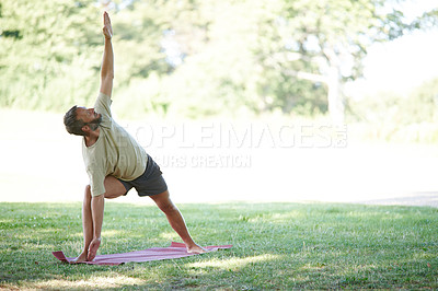 Buy stock photo Park, man and serious for yoga with stretching for fitness, exercise and workout in Germany. Male person, outdoor and  satisfied with side plank on grass for self care, health and wellness as routine