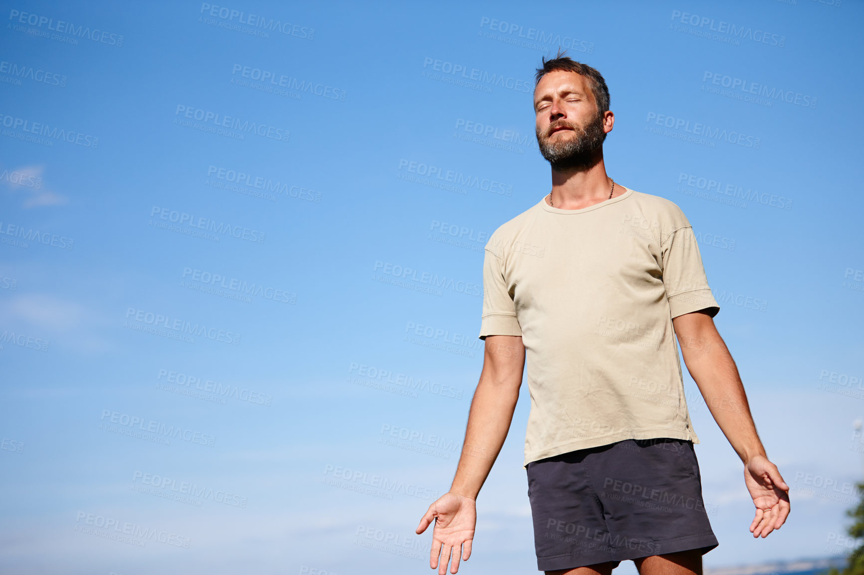 Buy stock photo Yoga, meditation and mature man outdoor for breathing exercise, mindfulness and fitness on mockup space. Mountain pose, yogi and calm for spiritual health, body wellness and relax for peace by sky