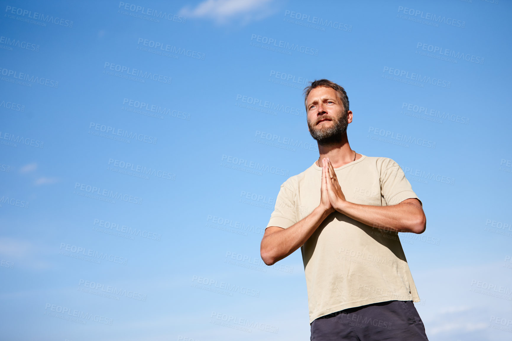 Buy stock photo Yoga, outdoor and mature man with namaste for breathing exercise, meditation or fitness. Prayer hands pose, yogi and calm for spiritual health, body wellness or relax for peace by mockup space on sky