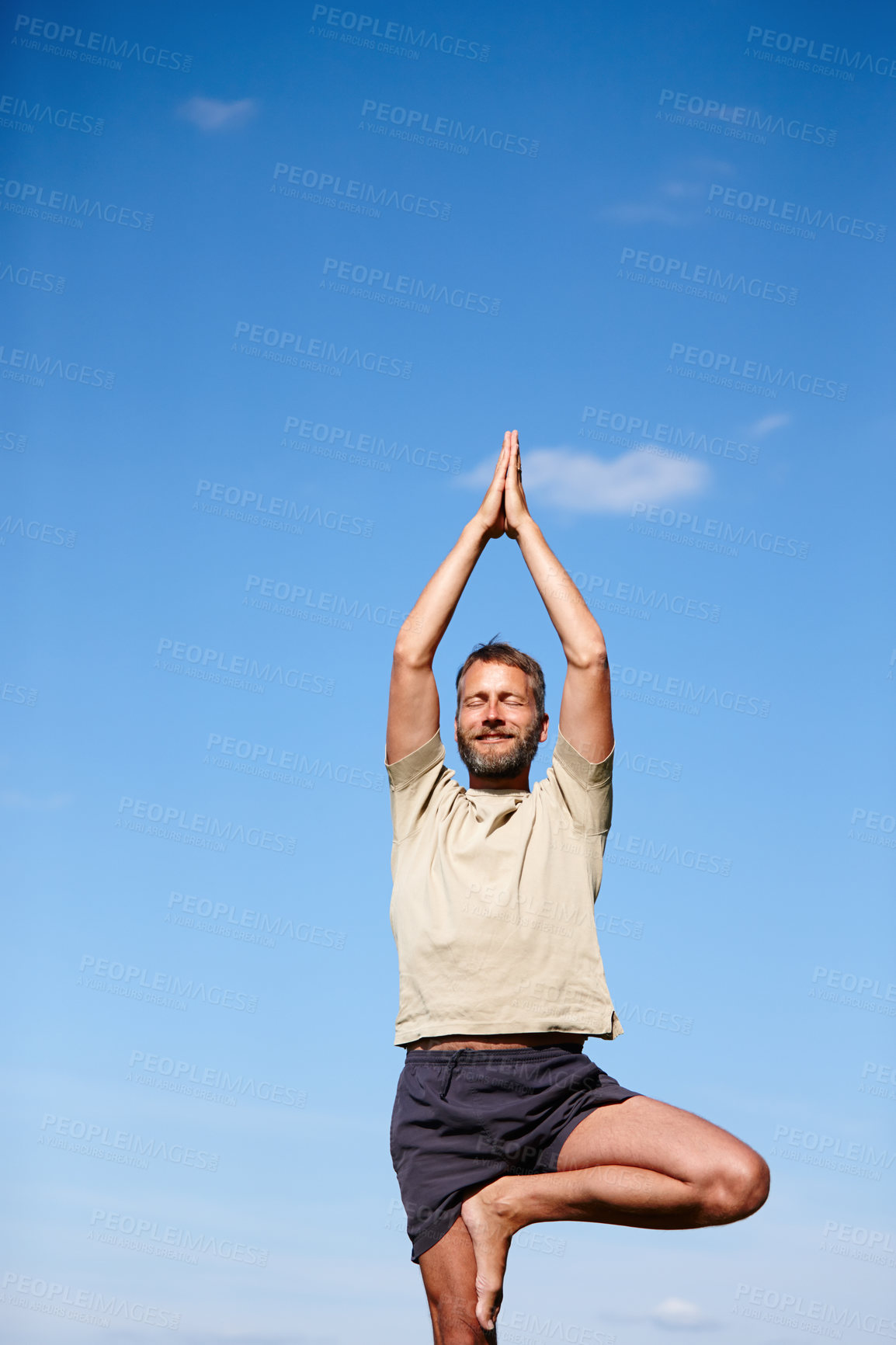 Buy stock photo Yoga, meditation and mature man with tree pose outdoor for breathing exercise, balance or fitness. Smile, yogi and calm with namaste for spiritual health, body wellness or stretching for peace by sky