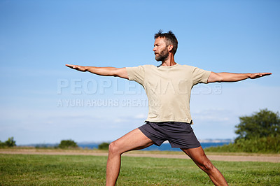 Buy stock photo Nature, man and stretching on grass with yoga for exercise, balance or mobility at park. Pilates, mature yogi and warrior pose on lawn for workout, holistic wellness or posture with fitness on mockup