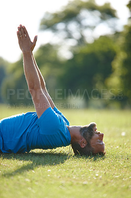 Buy stock photo Man, stretching and yoga in nature for exercise, health and back muscle in morning on green grass. Male person, field and activity outdoor for flexible workout, fitness and training with challenge 