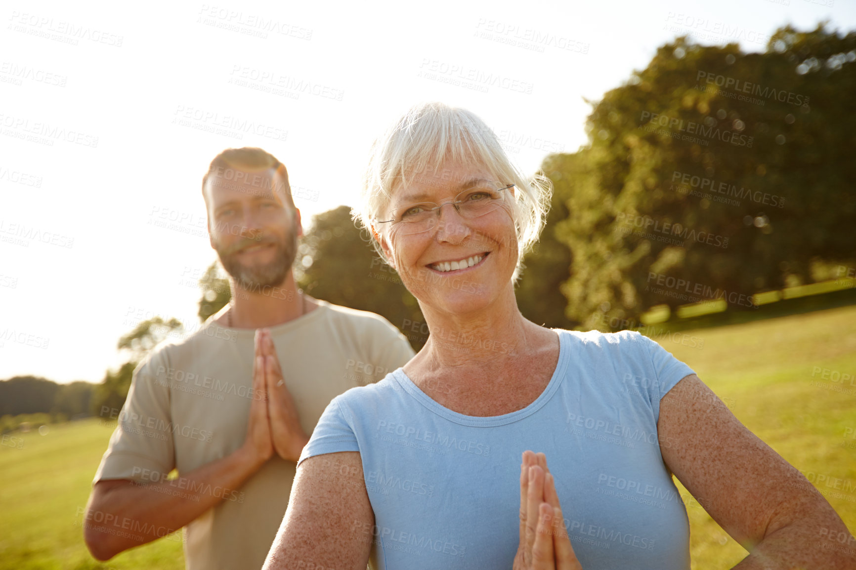 Buy stock photo People, prayer hands or yoga class in park for portrait, peace or holistic activity for mental health. Mature pilates group, zen or gesture on grass for balance, fitness session or breathing exercise