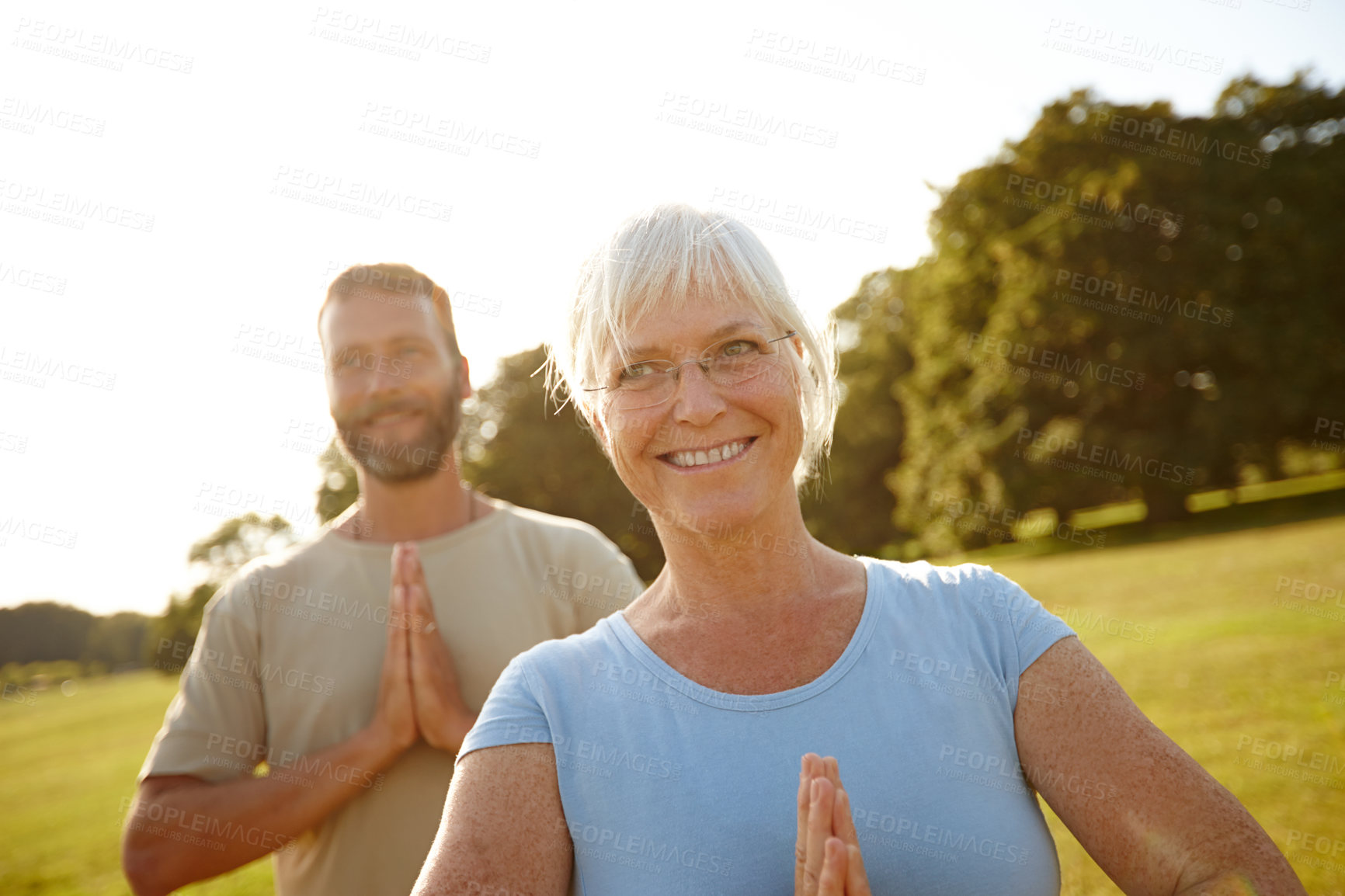 Buy stock photo People, prayer hands or yoga class in park for peace, wellness or holistic activity for mental health. Mature pilates group, zen or gesture on grass for balance, fitness session or breathing exercise