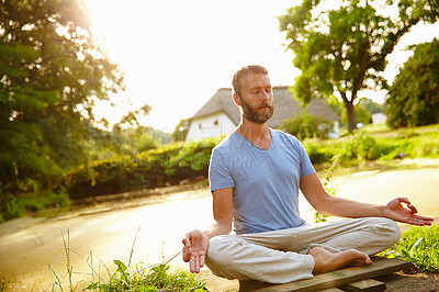 Buy stock photo Lotus meditation, garden and man in nature with calm, relax and balance for mindfulness. Zen, outdoor and male person with padmasana pose for breathing, health and wellness outdoor in park for zen.