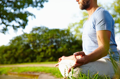 Buy stock photo Man, outdoor and hands to practice yoga, meditation and mindfulness for healing chakra. Male person, lotus position and holistic pose for spiritual awareness, morning fitness and peace in exercise