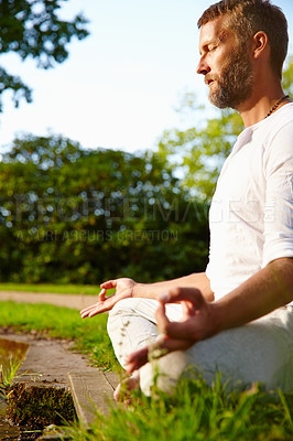 Buy stock photo Meditation, lotus position and man in nature for relax, calm and grounding exercise in morning. Health, peaceful and male person in padmasana for outdoor flexibility, balance and mindfulness.