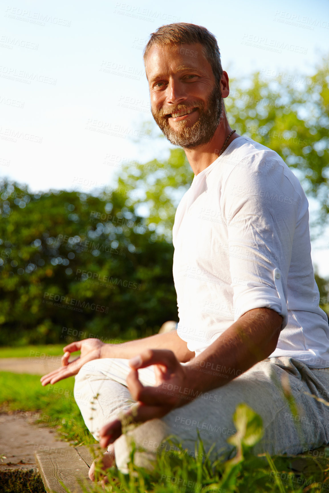 Buy stock photo Portrait, lotus position and man in nature for relax, calm and grounding exercise in morning. Health, meditation and person from Italy in padmasana for outdoor flexibility, balance and mindfulness