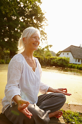 Buy stock photo Meditation, lotus posture and senior woman in nature for relax, calm and zen in morning. Health, peaceful and elderly female person in padmasana for outdoor flexibility, balance and mindfulness.