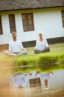 Buy stock photo Calm, yoga and meditation for team, outdoor and fitness in nature, grass and mindfulness of aura. Chakra, lens flare and people in park, wellness and spiritual for peace, soul and together with faith