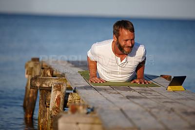 Buy stock photo Happy man, lake and yoga with tablet for online tutorial, lesson or virtual class in nature. Mature, male person or yogi with smile for holistic training, workout or exercise on technology or app