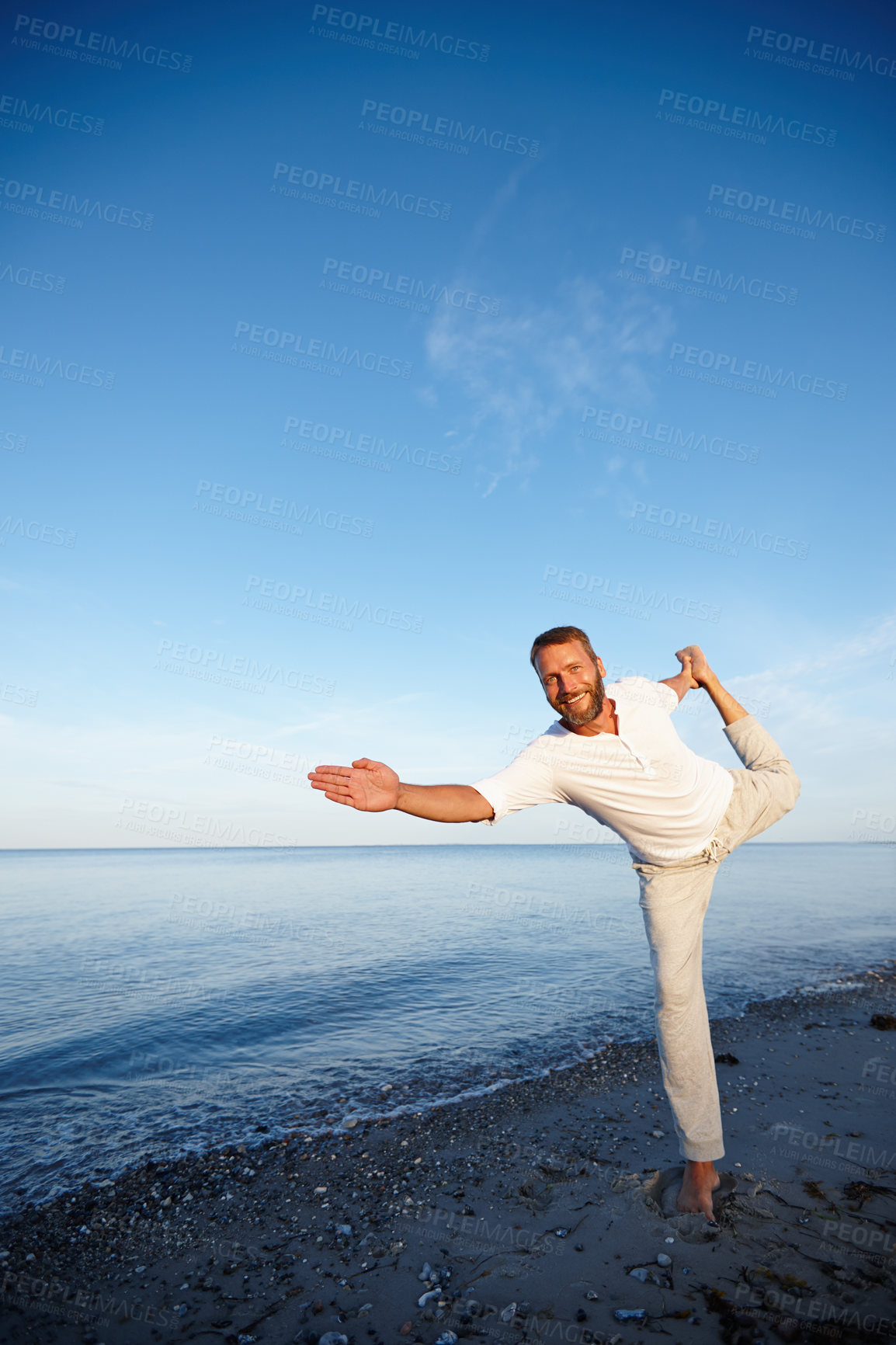 Buy stock photo Portrait, man and stretching for yoga by ocean with flexible body, spiritual wellness and balance performance. Mature, person and warm up with chakra peace, mindfulness healing and fitness outdoor
