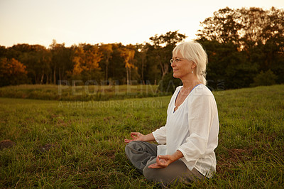 Buy stock photo Relax, lotus pose and woman in nature for meditation, calm and grounding exercise in morning. Health, peaceful and senior female person in padmasana for outdoor flexibility, balance and mindfulness.