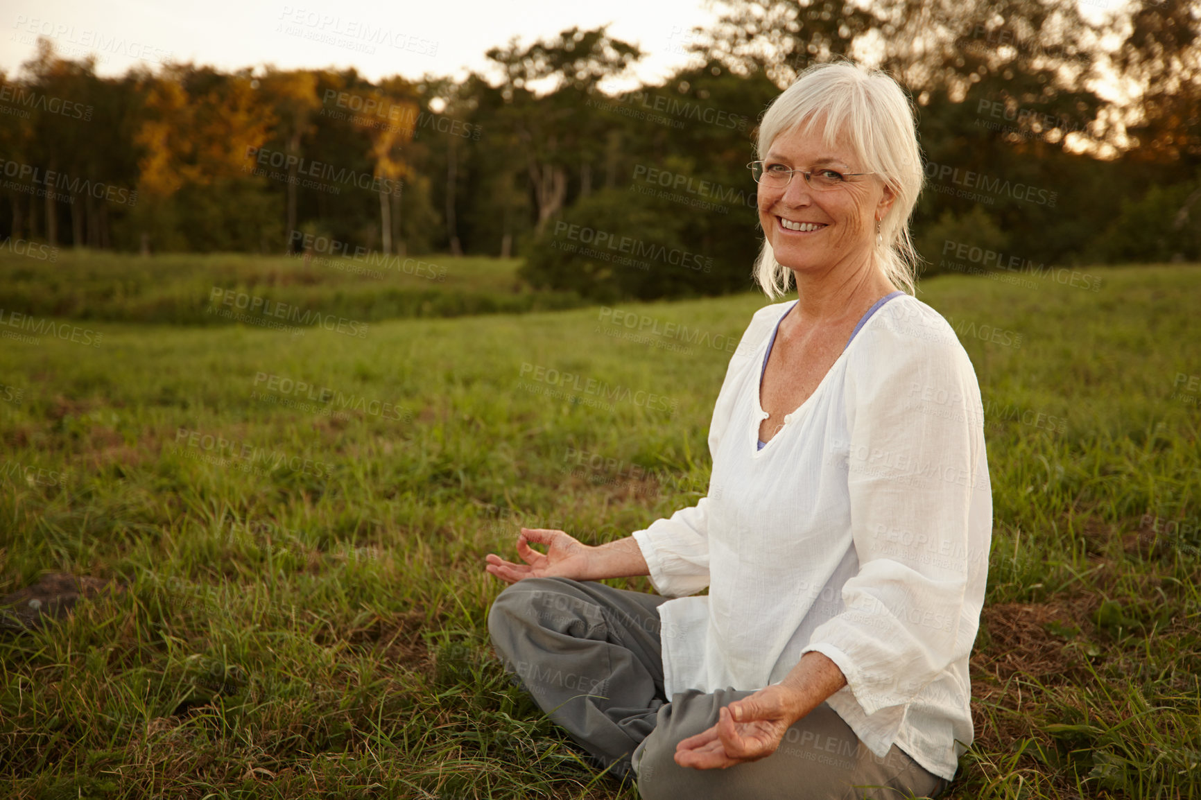 Buy stock photo Zen, lotus pose and portrait of woman in nature for relax, calm and wellness in morning. Health, meditation and senior female person in padmasana for outdoor flexibility, balance and mindfulness.