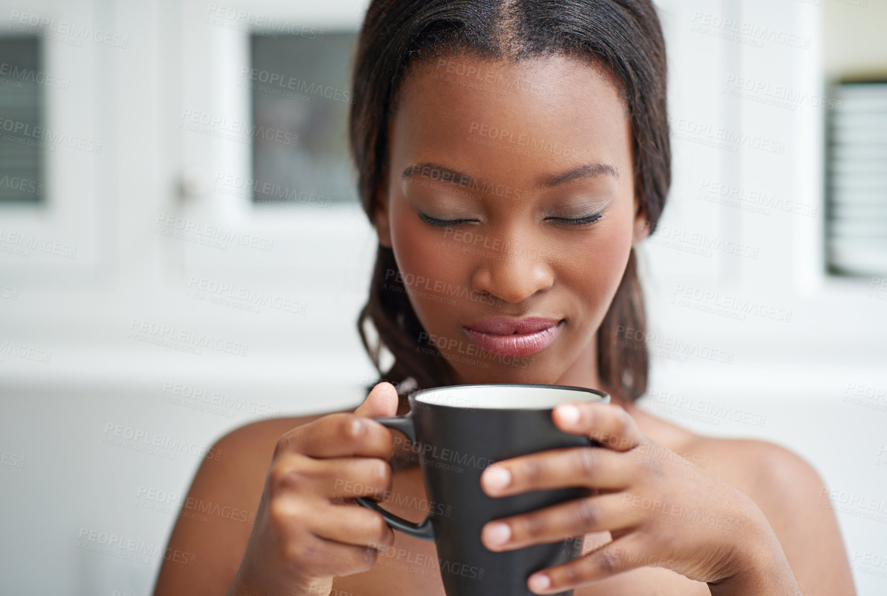 Buy stock photo Black woman, smell tea and relax in home for peace, calm or thinking of espresso for wellness. Eyes closed, morning and aroma of healthy coffee drink, fresh scent and dream of latte to enjoy beverage