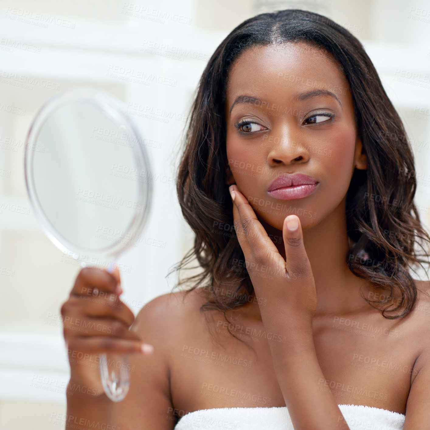 Buy stock photo Makeup, beauty and black woman with mirror in bathroom for cosmetics, check and inspection at home. Towel, thinking and female person with reflection in house for results, shine and morning routine