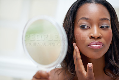 Buy stock photo Makeup, beauty and black woman with mirror in home for cosmetics, inspection and check in bathroom. Hand, thinking and female person with reflection in house for morning routine, results and shine