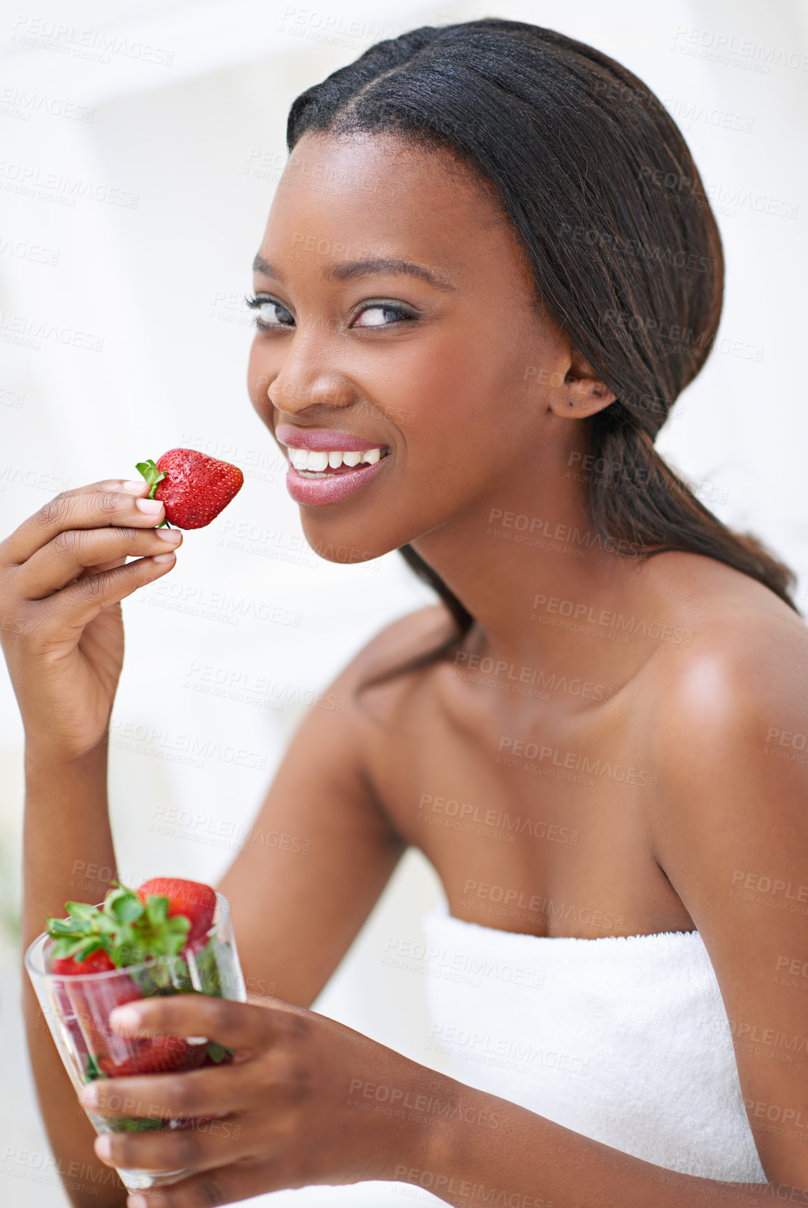 Buy stock photo Black woman, portrait and strawberry for healthy diet in home, nutrition and organic fruit for wellness. Female person, relax and morning breakfast in kitchen, vegan and paleo food for weight loss