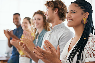 Buy stock photo Cropped shot of a group of young coworkers applauding with enthusiasm