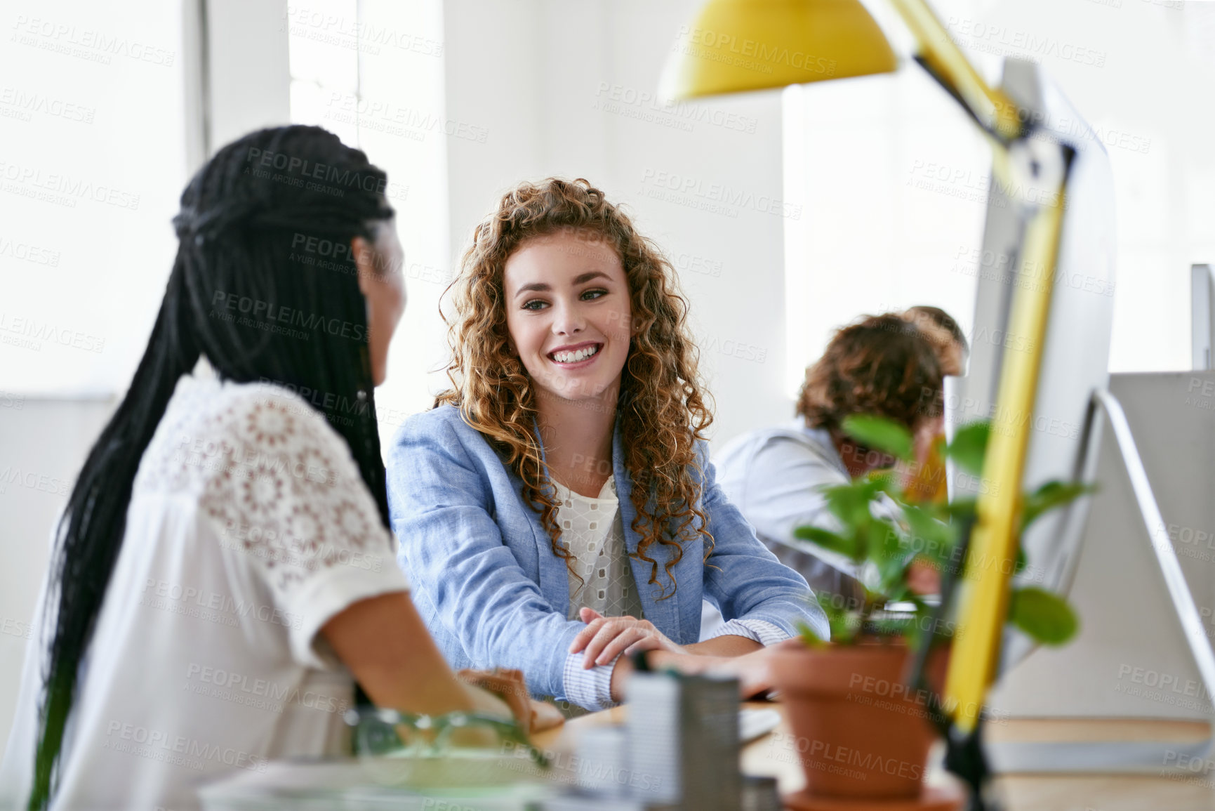 Buy stock photo Happy woman, break or people in office talking, chatting or speaking of gossip or funny news together. Bond, smile or relaxed women in conversation or discussion about on blog or article at desk 