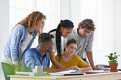 Buy stock photo Diversity, business people and writing in meeting for collaboration, planning or strategy at the office. Group of diverse employees working on paperwork, documents or team brainstorming at workplace