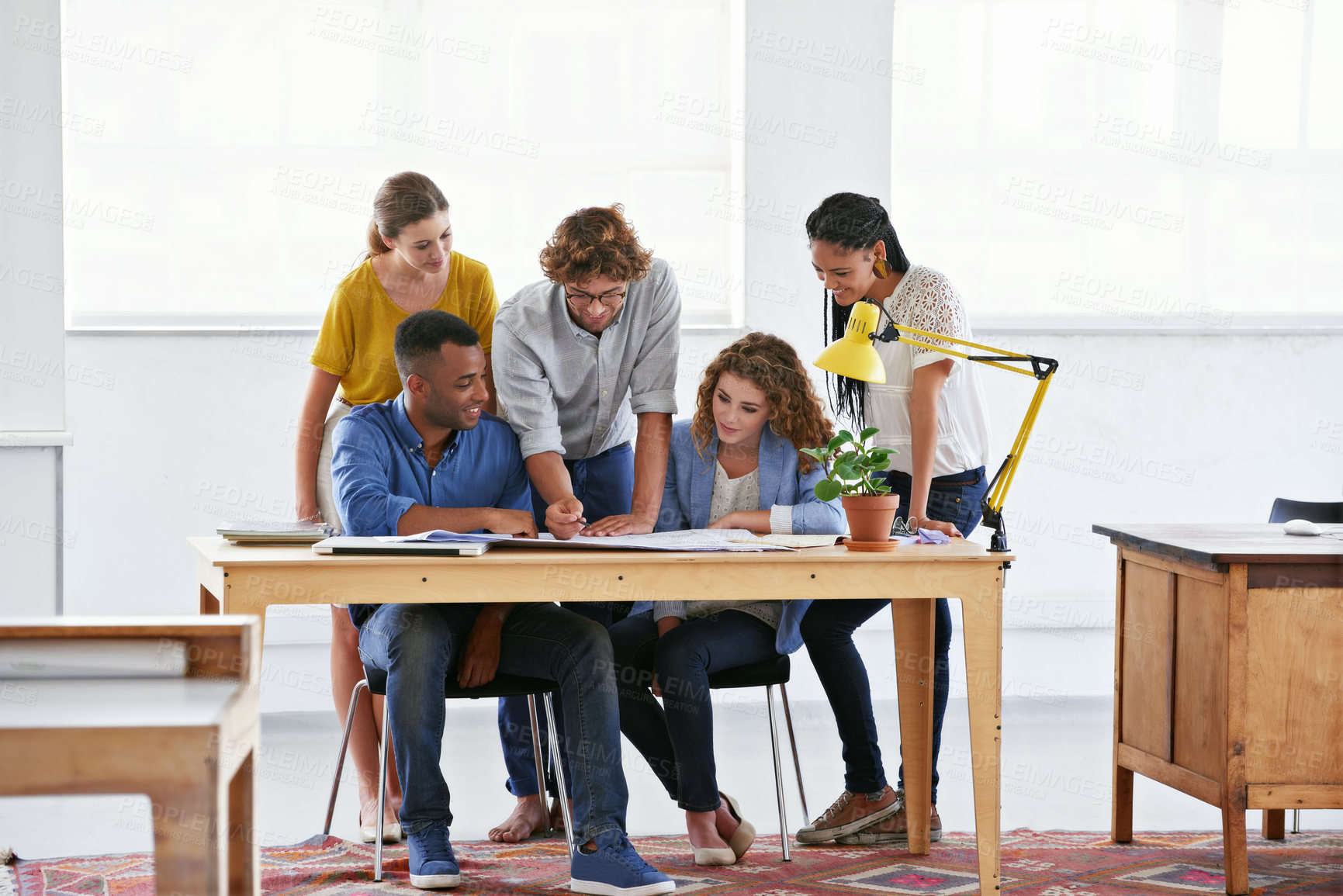 Buy stock photo Diversity, business people and documents in collaboration, meeting or strategy for team brainstorming at the office. Group of employees working on paperwork or project plan in teamwork at workplace