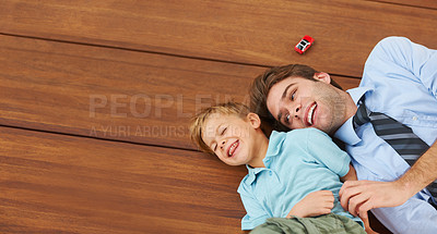 Buy stock photo Dad, child and happiness in house with hug for Father's Day, quality time and playing together. Parent, young kid and laughing in family home for support with loving relationship, toys and love