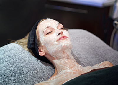 Buy stock photo A young woman getting a facial at a spa