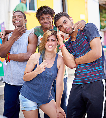 Buy stock photo Portrait of a group of teenagers standing in the streets of Brazil