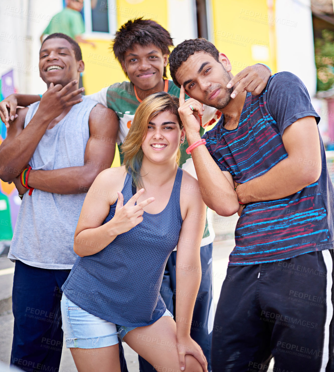 Buy stock photo Portrait of a group of teenagers standing in the streets of Brazil