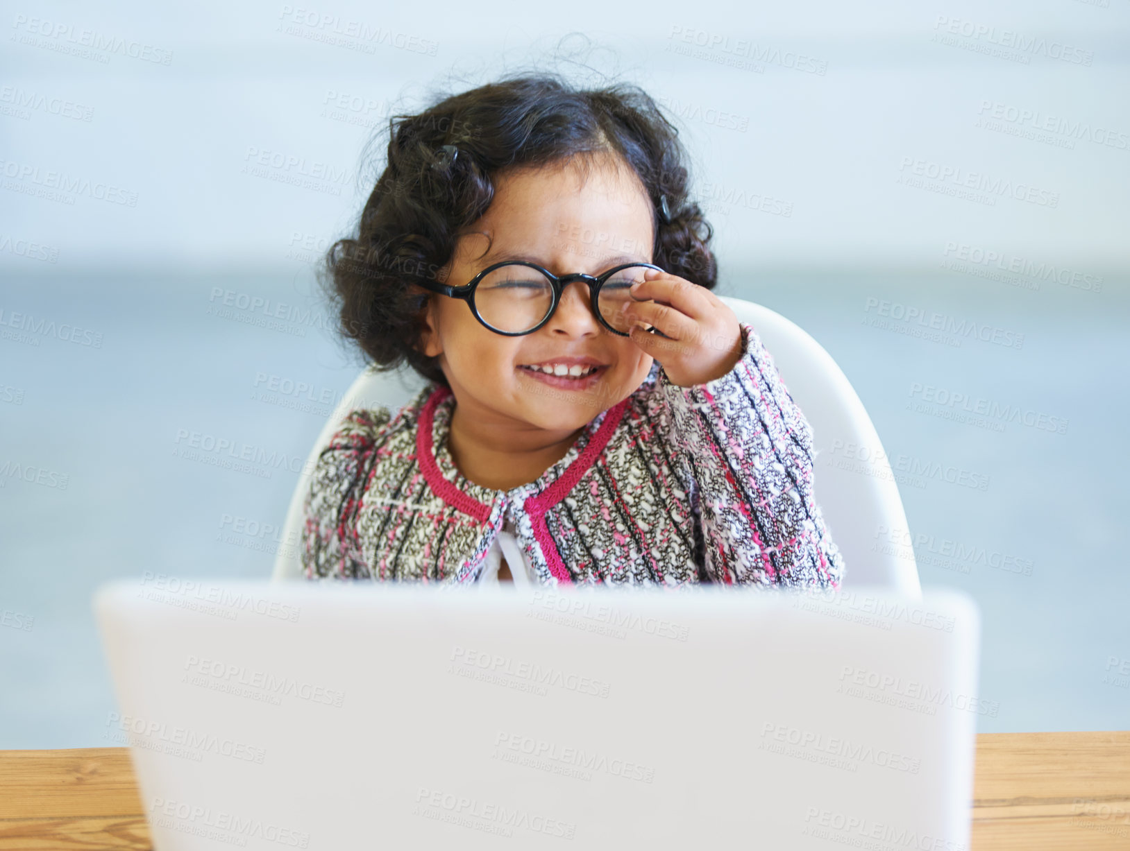 Buy stock photo Little girl, dress up and laptop play business person fun, smile or laugh in fancy clothes. Toddler, glasses or office desk funny joke, childhood joy or cosplay for genius, amusement or performance