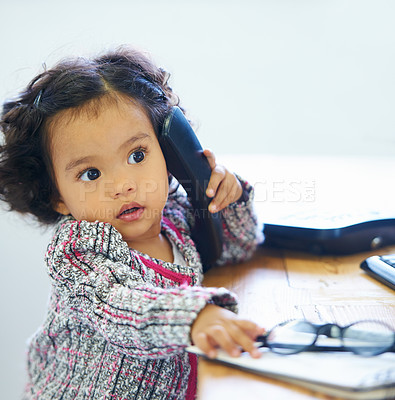 Buy stock photo Little girl, phone and call play for imagine, communication or childhood funny joke. Female person, learning development and landline talking for game telephone or career growth fun and comedy
