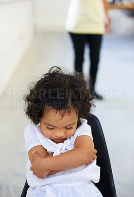 Buy stock photo A little girl being scolded for being naughty