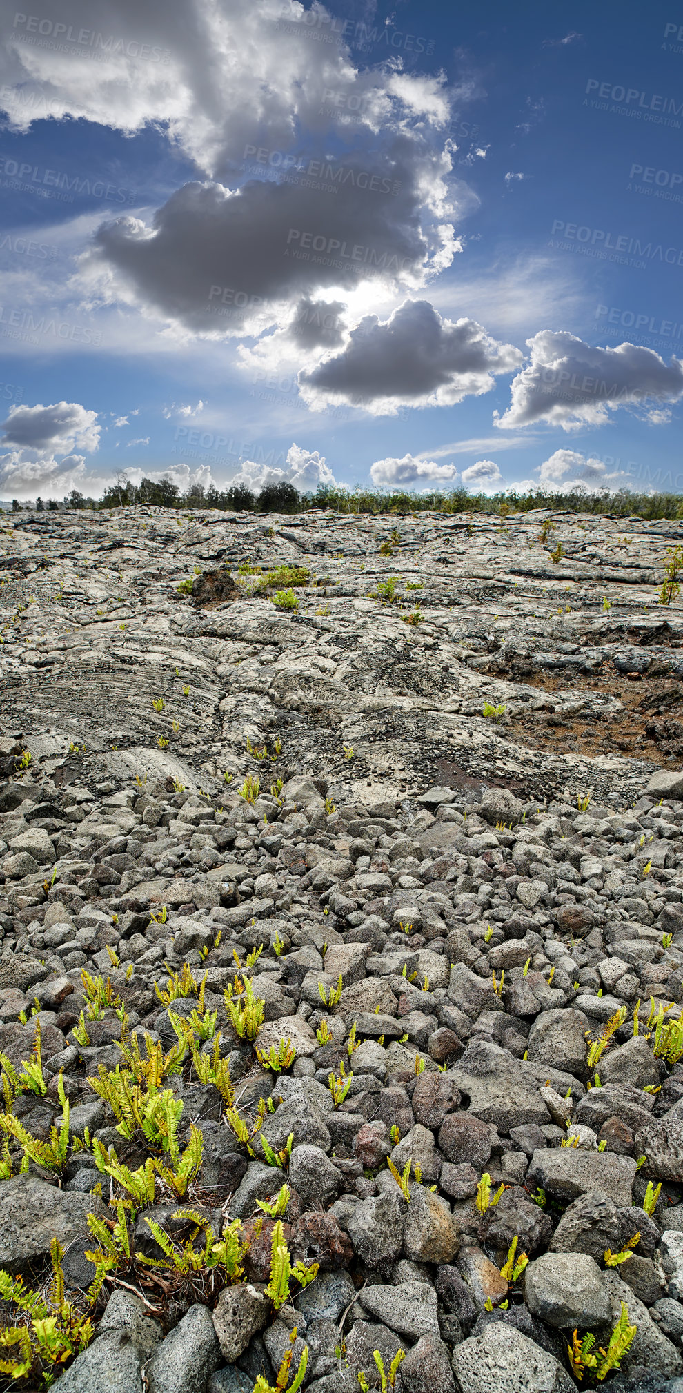 Buy stock photo Landscape of cooled lava flow with copy space, Big Island, Hawaii. Scenic view of Mauna Kea, a dormant volcano in a secluded open location. Blue cloudy sky near stone ground summit of a volcanic land