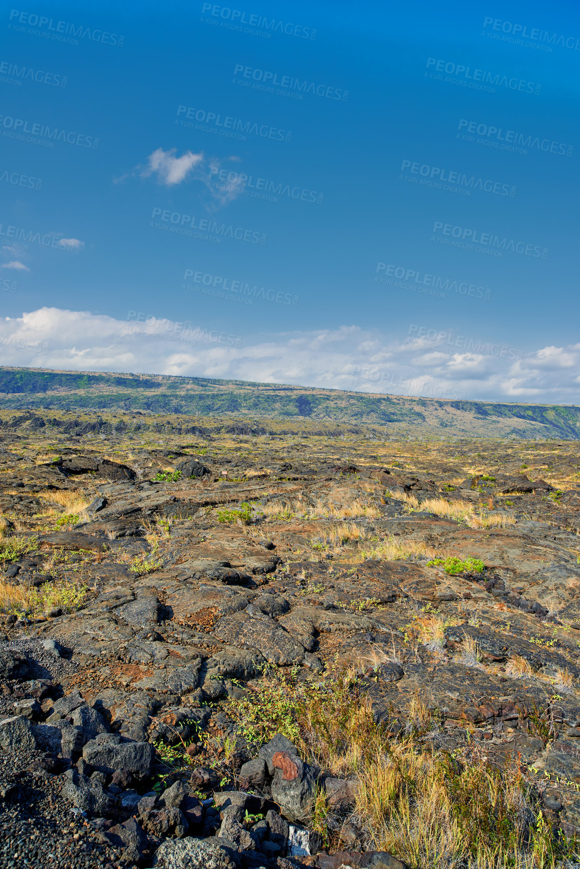 Buy stock photo Landscape view of Big Island of Hawaii with copy space. Scenic view of Mauna Kea dormant volcano with copyspace. Vast expanse of cooled lava flow in nature and blue sky near a summit of volcanic land