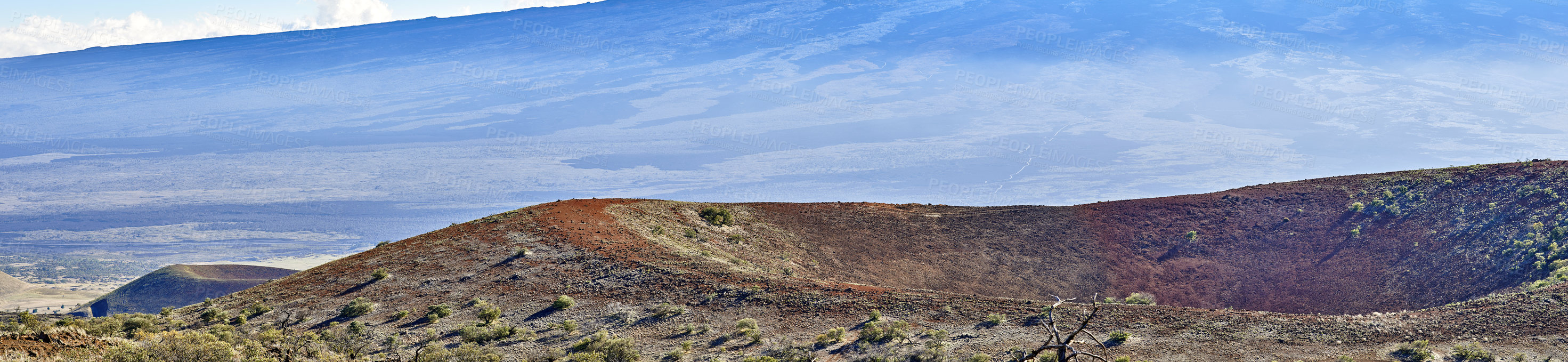 Buy stock photo Panoramic view of mountain landscape in Hawaii, USA with a background of blue sky and copyspace. Open field of nature and ecological life near the world's largest active volcano on earth 