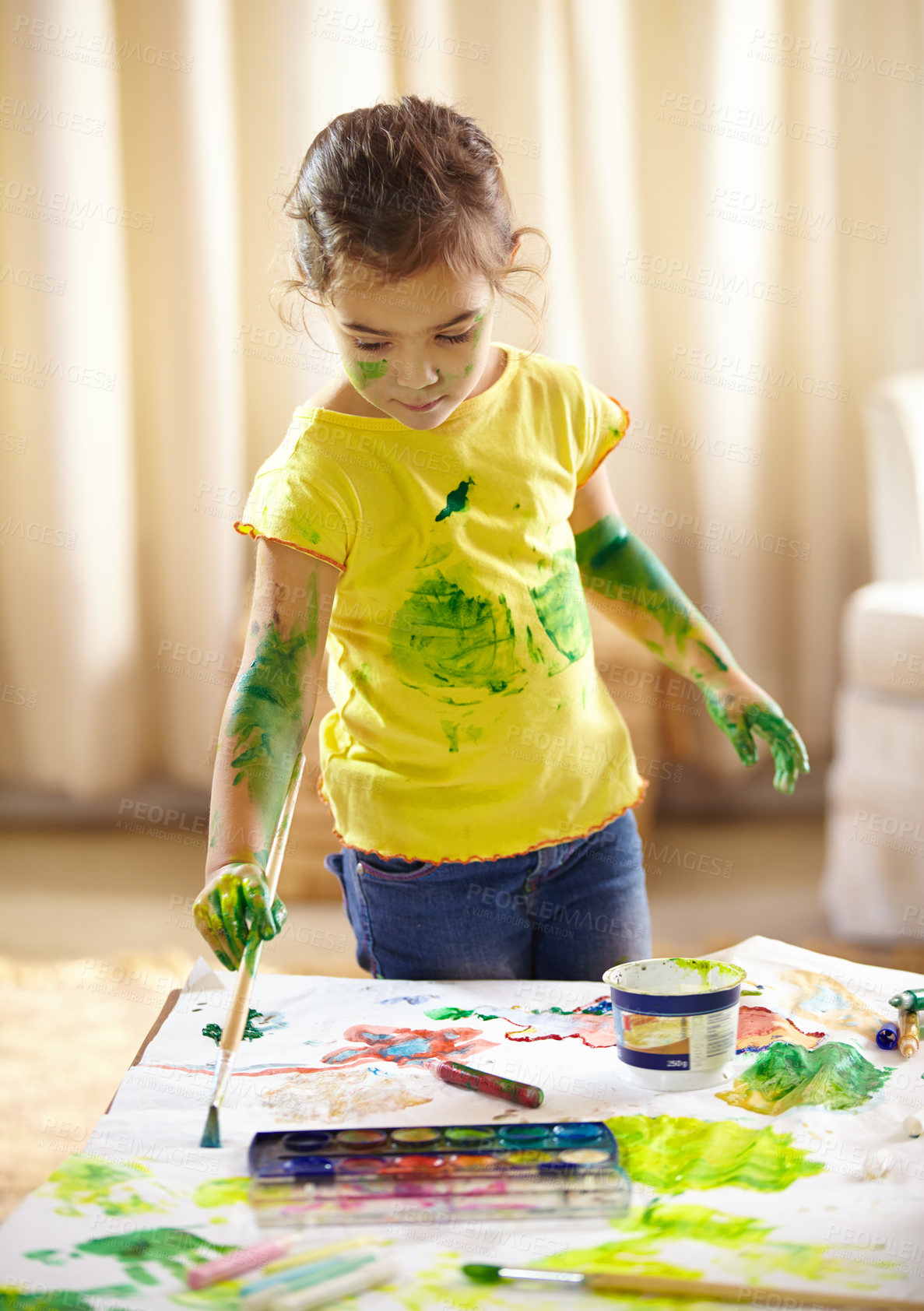 Buy stock photo Painting, messy and girl kid with homework, assignment or project for school at home. Colorful, art and young student drawing on paper for creative hobby, child development or activity at house.